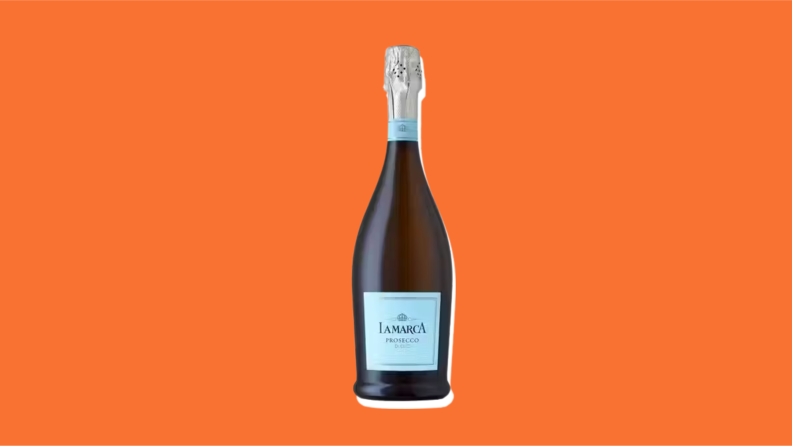 A blue bottle of La Marca Prosecco on an orange background.