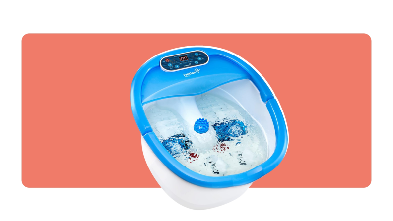 Product shot of a blue and white Ivation Foot Spa filled with water and bubbles.