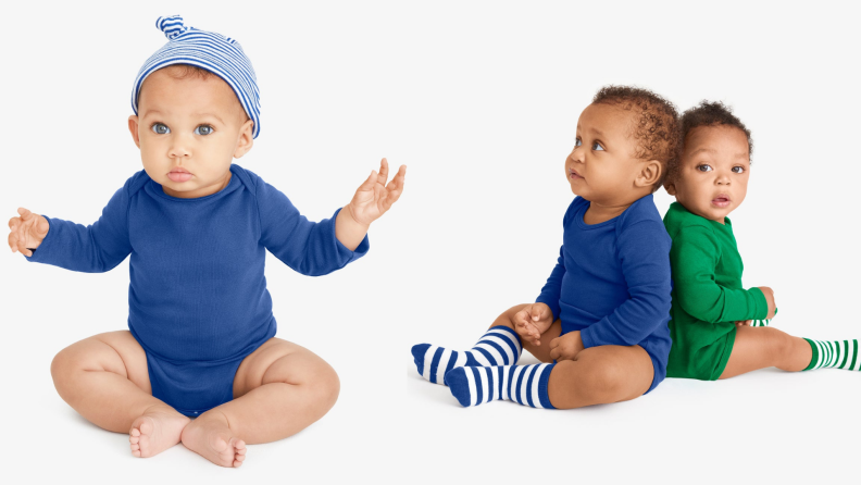 Babies wearing blue and green solid onesies.