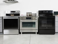 Three ranges in a room lined up next to each other