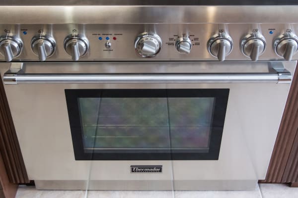 Oven, controls, and handle