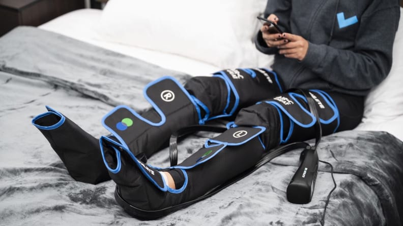 Image of compression massager device on legs