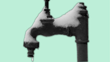 Frozen outdoor faucet with snow on top and icey water dripping out against a teal background.