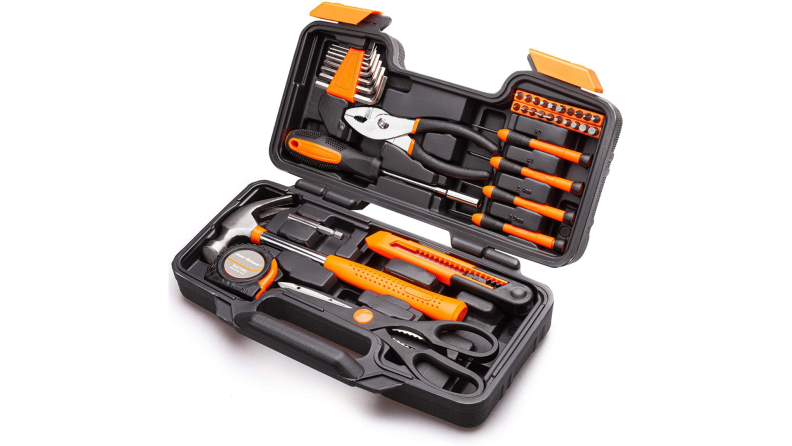 Household tools arranged inside a tool kit.