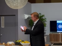SmartThings CEO Alex Hawkinson controlling a mock SmartThings home from his smartphone