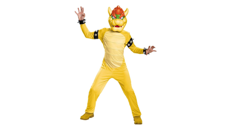 Person wearing a yellow Bowser costume with a mask.