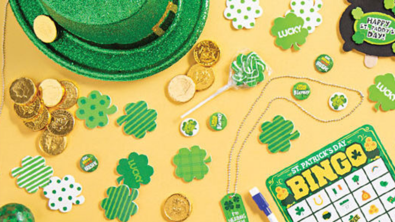 St. Patricks' Day decor spread out on a yellow surface