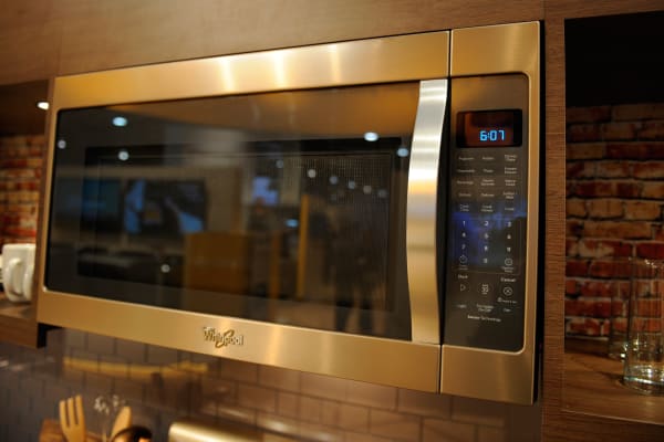 A Sunset Bronze microwave adds the finishing touch to a complete kitchen suite.