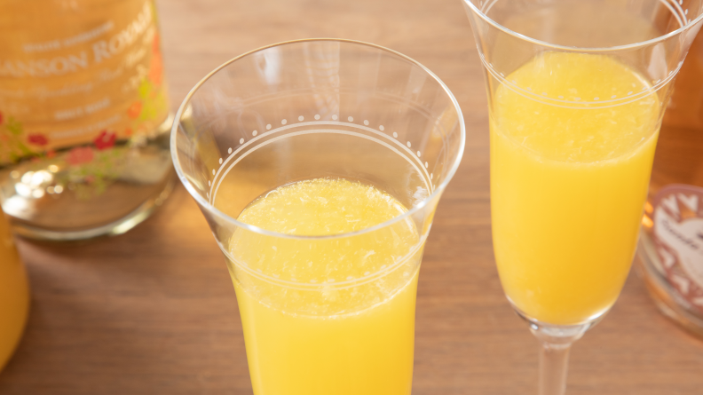 Close-up of champagne flute filled with a mimosa