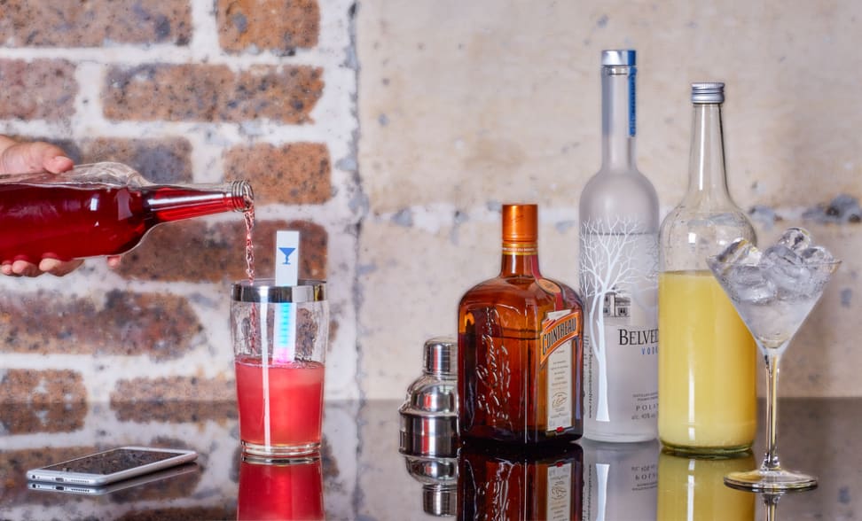 The MixStick with assorted glassware and beverages