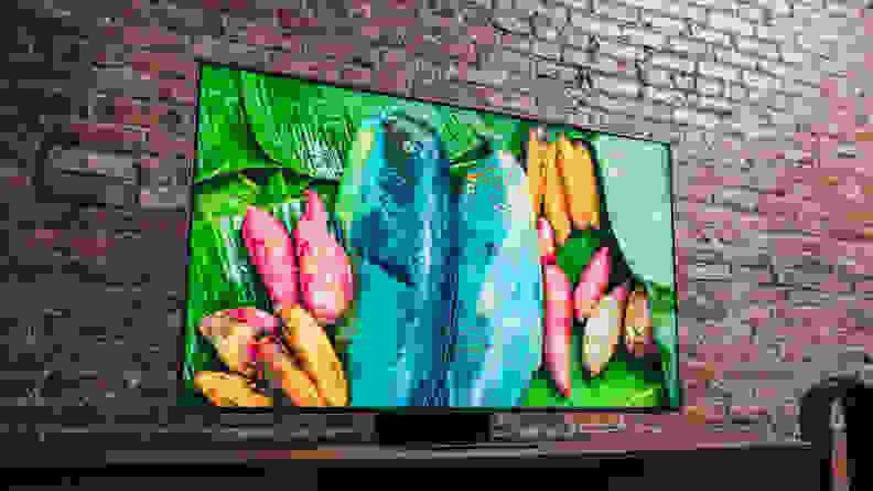 The Samsung QN90A displaying 4K/HDR content in a living room setting