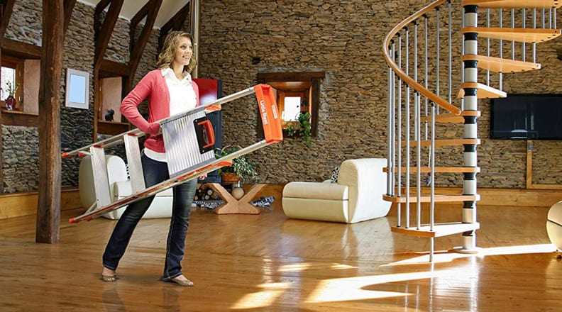 Walking through house with ladder