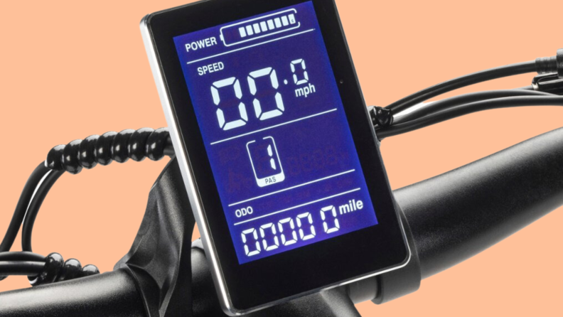 The display of the SWFT Apex ebike, showing full power, 1 passenger, 0 miles per hour on the speed readings, and 0 miles logged on the odometer.