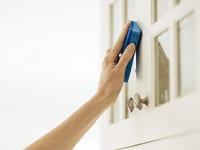 Cleaning door with sponge