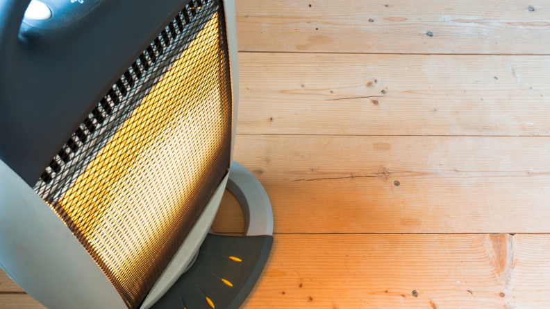 Space heater heating on a wooden floor