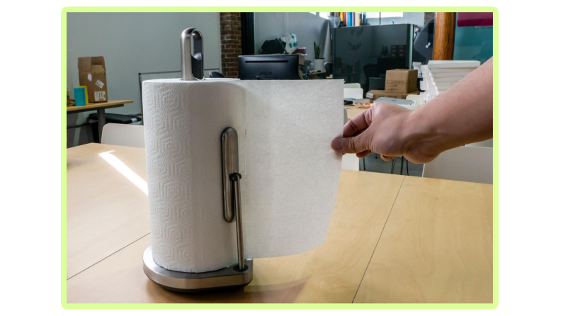The Simplehuman Paper Towel Pump dispensing towels
