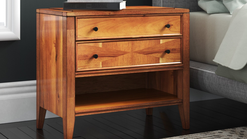 A large wooden nightstand.