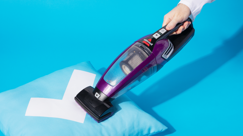 The Bissell Pet Hair Eraser 2390 cleaning a pillow