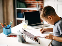 A child studies at home