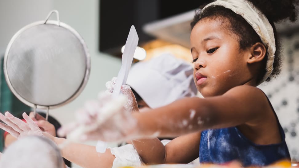 Little girls cooking in a kitchen