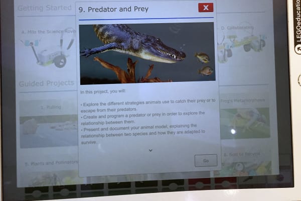 LEGO WeDo 2.0 lesson module explaining predators and prey