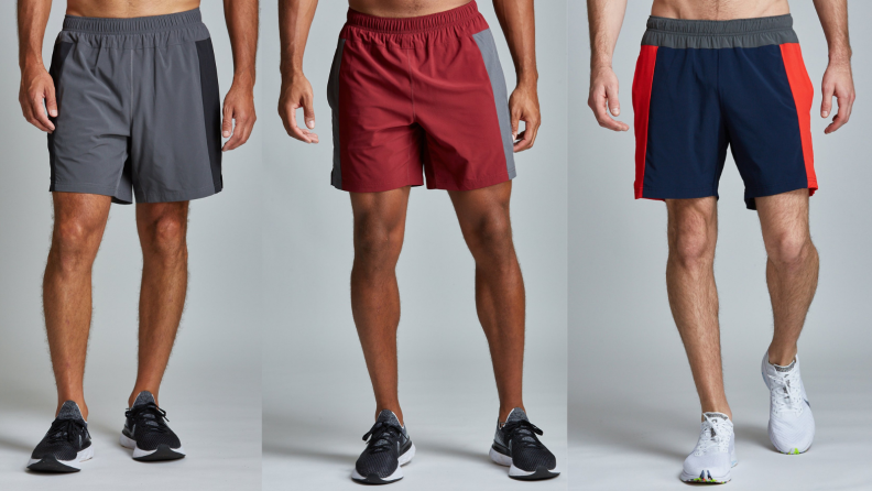 three men wearing bolt shorts in a variety of colors