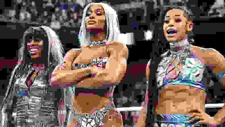 WWE superstars Naomi, left, Jade Cargill, and Bianca Belair during a