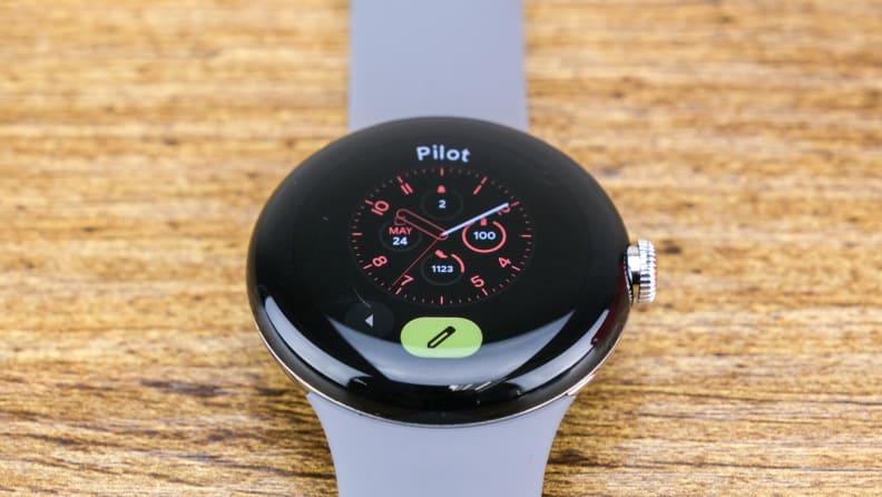 A Google Pixel Watch's customization pane is open, waiting for input.