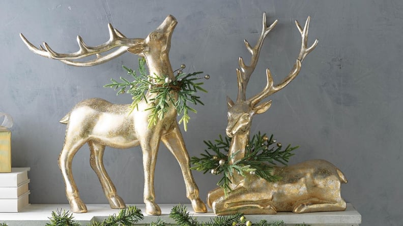 These sweet animals have holiday wreaths around their necks.