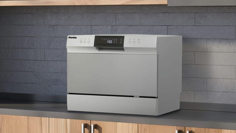 The Danby countertop dishwasher set up on a kitchen counter.