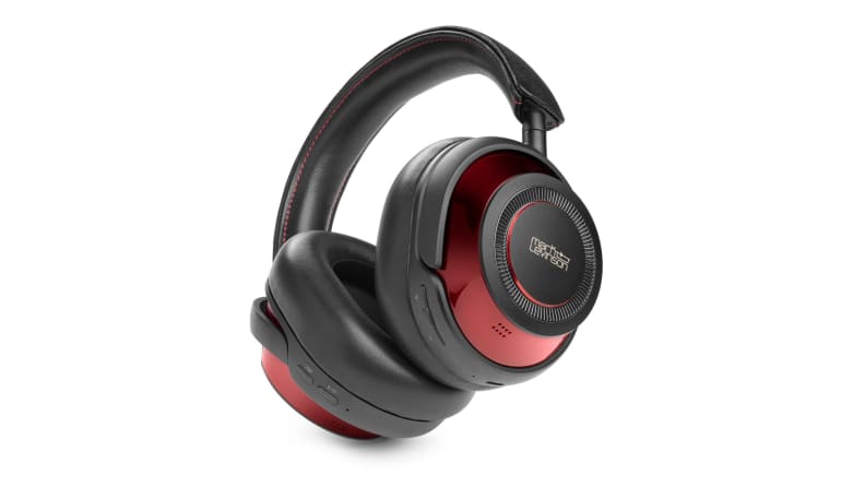 A pair of stylish headphones in race car red aluminum float on a white background.