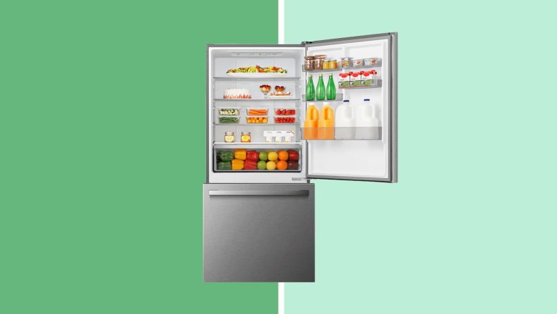 A modern fridge opens its door to display vegetables.
