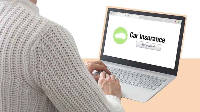 Person using a laptop to search for car insurance online.
