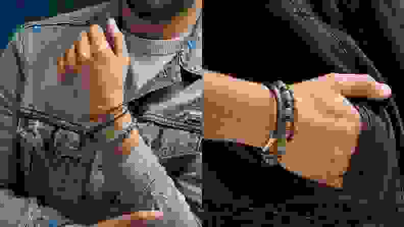 man holding bracelets on wrist