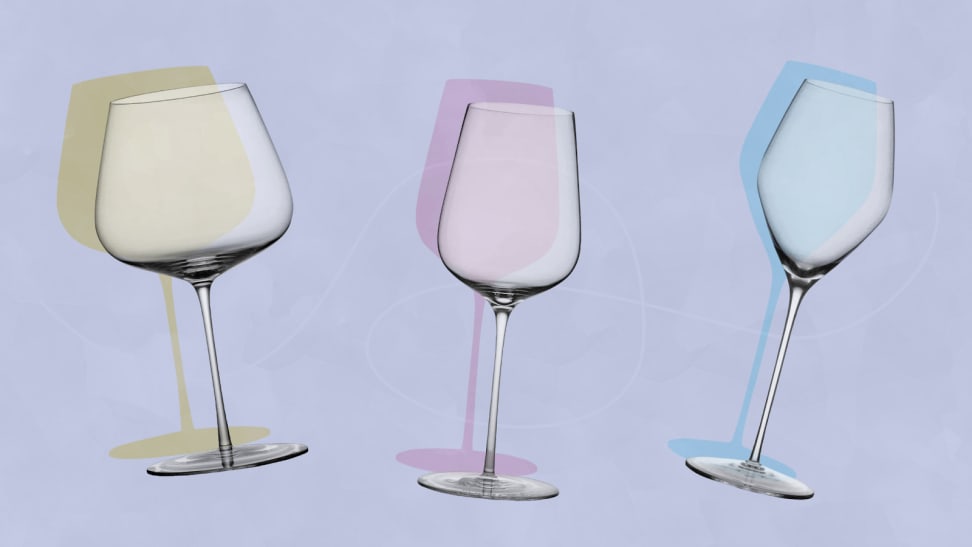 A yellow red wine glass, a pink white wine glass and a blue champagne glass sit next to each other on a lavender background.