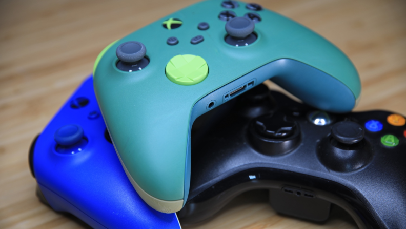 The Xbox Wireless Controller Remix Special Edition on top of other regular Xbox controllers.