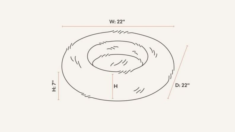 An illustration of the Tuft + Paw Nuzzle cat bed shows its dimensions, 22 inches wide and 7 inches tall