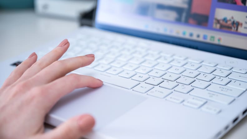 person uses trackpad