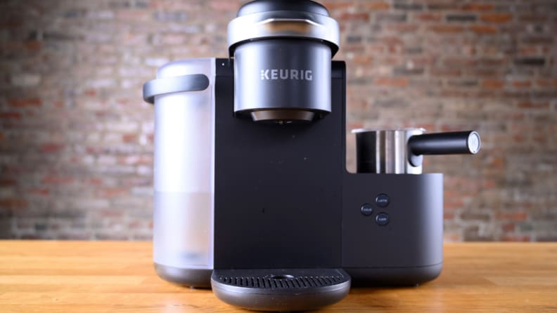 A black Keurig K-Café single serve coffee maker.