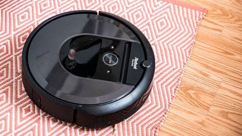 An image of a Roomba vacuum on a floor.