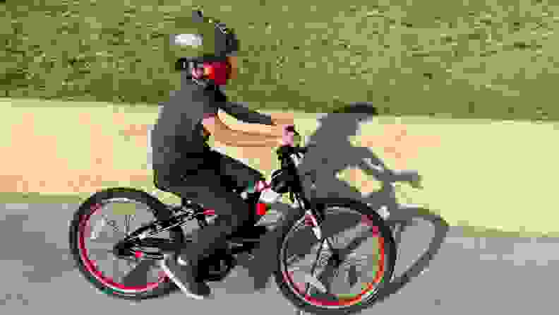 A boy riding a Guardian Kids Bike
