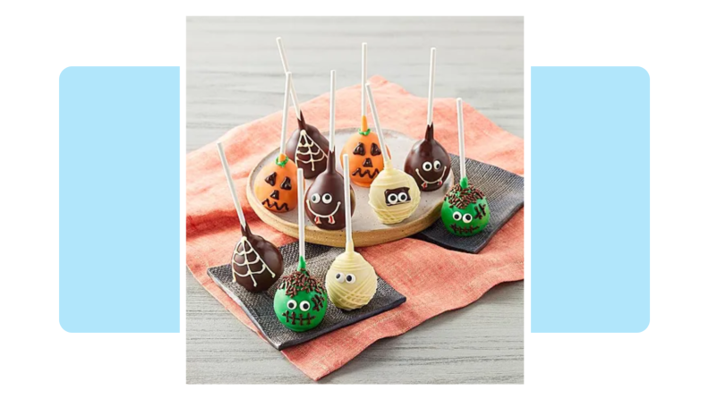 A collection of Halloween cake pops including ghosts, monsters and Jack-o-Lanterns in front of a background.