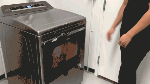 Animated GIF of a person opening a dryer.