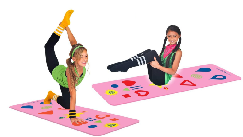 Two children practice yoga on Phresh yoga mats.