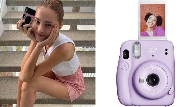purple camera on white background on right, woman holding camera on left