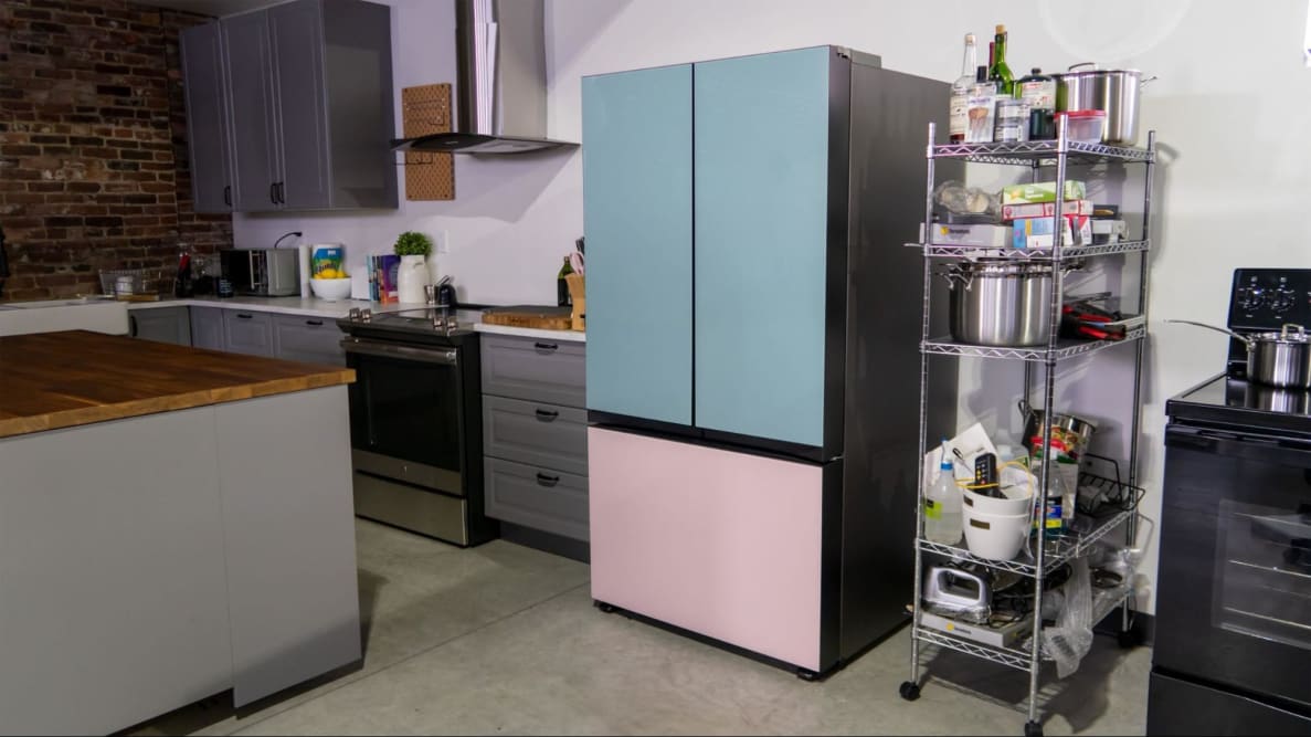 A kitchen featuring a Samsung refrigerator with the color pairing of aqua green french-doors and light pink bottom freezer.