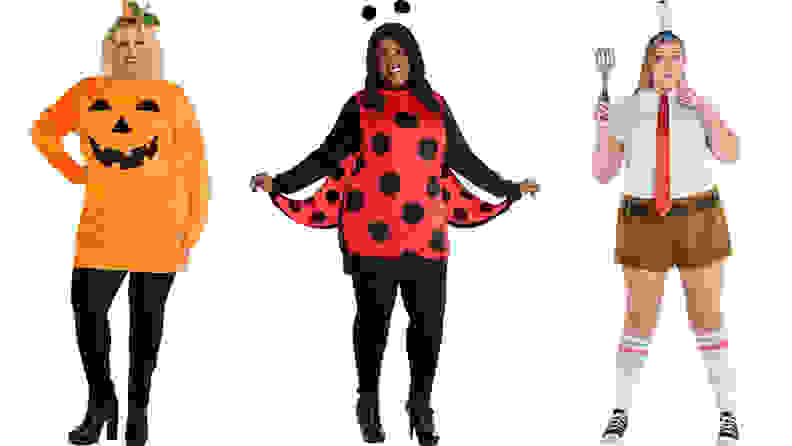 three women standing next to each other wearing costumes: pumpkin costume, ladybug costume, spongebob costume