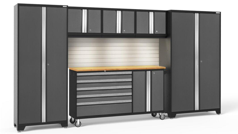 Large storage system with cabinets and shelving in a gray color