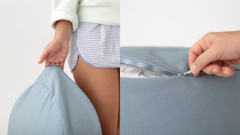 Someone holding the cushion by the pocket/handle and unzipping the cover.