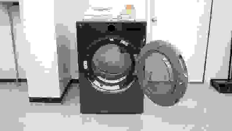 The LG DLEX6700B Dryer with its door open.